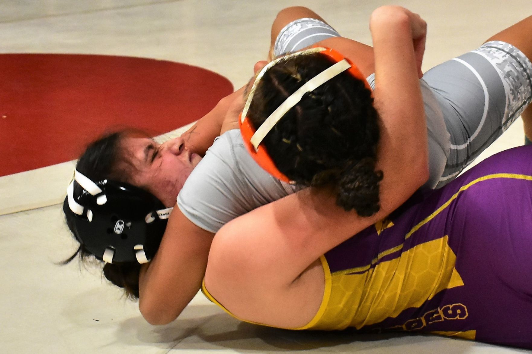 Righetti's Kitana Fleming giving it her all to control Atascadero's Elanor Rodriguez
